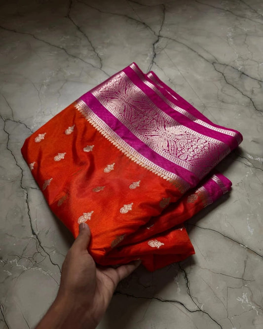 Vibrant Orange Silk Saree with Butti Motifs & Contrast Pink Brocade Border